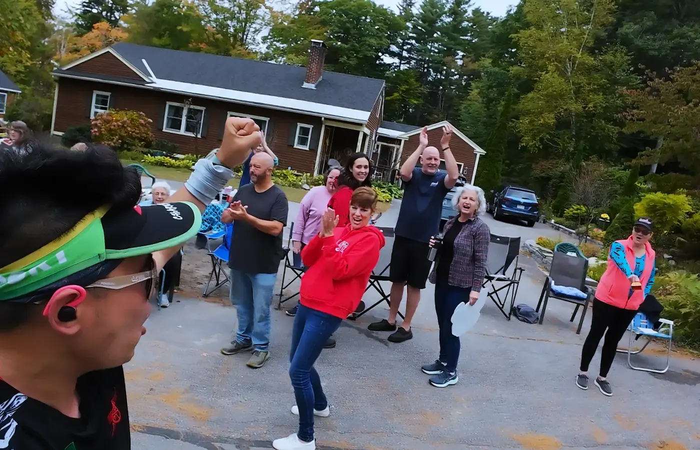 Residents and runners clustered near a