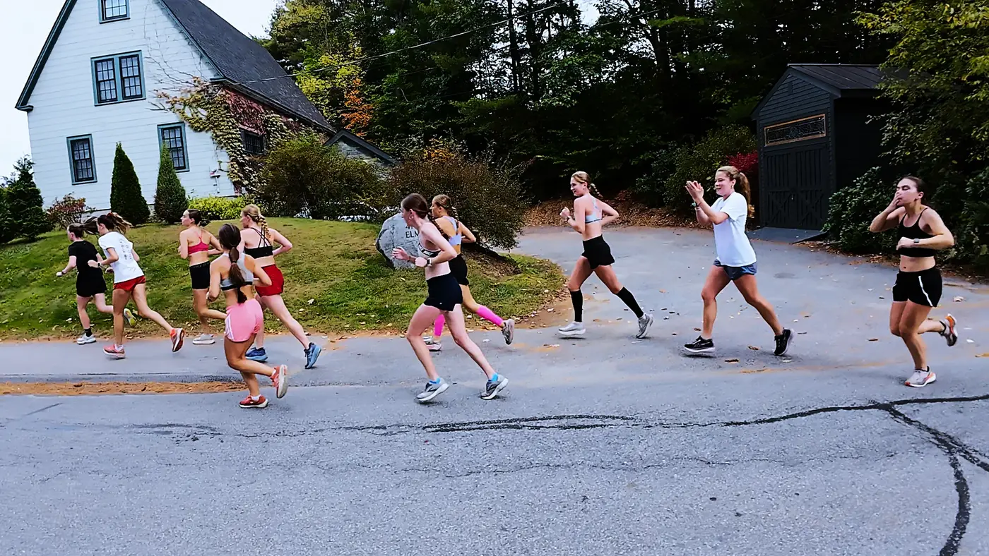 group of young runners crossing the course